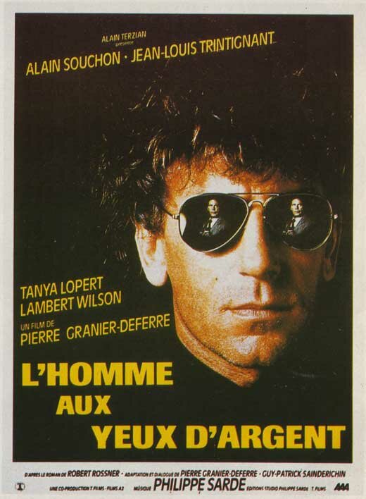 Человек с глазами цвета серебра (1985) постер